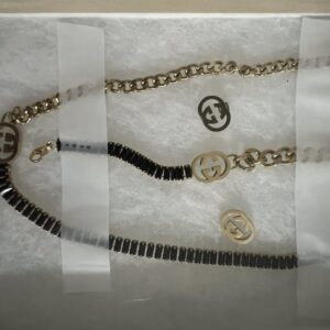 Trendy Luxe: Layered Gold-Tone Chain Set with Black Bead Accents